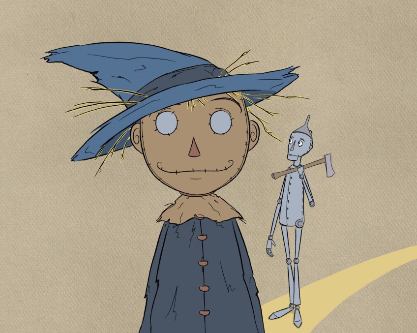 The Scarecrow and Tin Woodsman on the yellow brick road